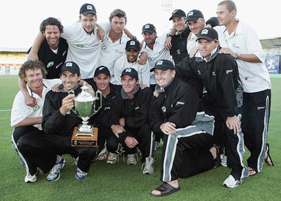 The New Zealand team pose with the trophy following their 4-1 series win over Sri Lanka