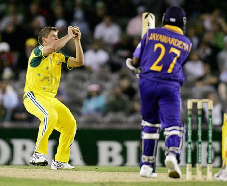 James Hopes take a catch off his own bowling to end Mahela Jayawardene's resistance