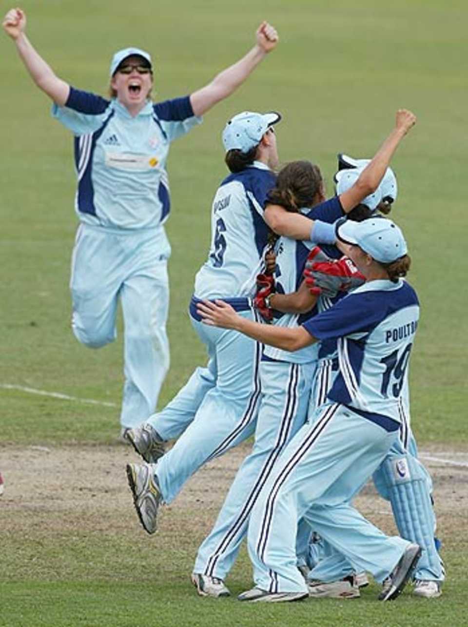 NSW cricketers celebrate their thrilling win over Queensland