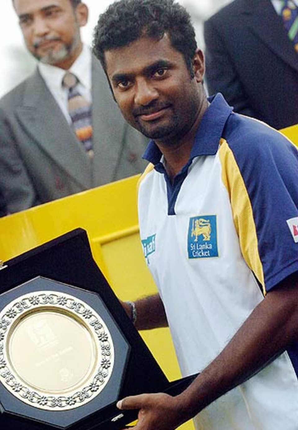 Muttiah Muralitharan with the Man-of-the-Series trophy, Bangladesh v Sri Lanka, 2nd Test, Bogra, 4th day, March 11 2006