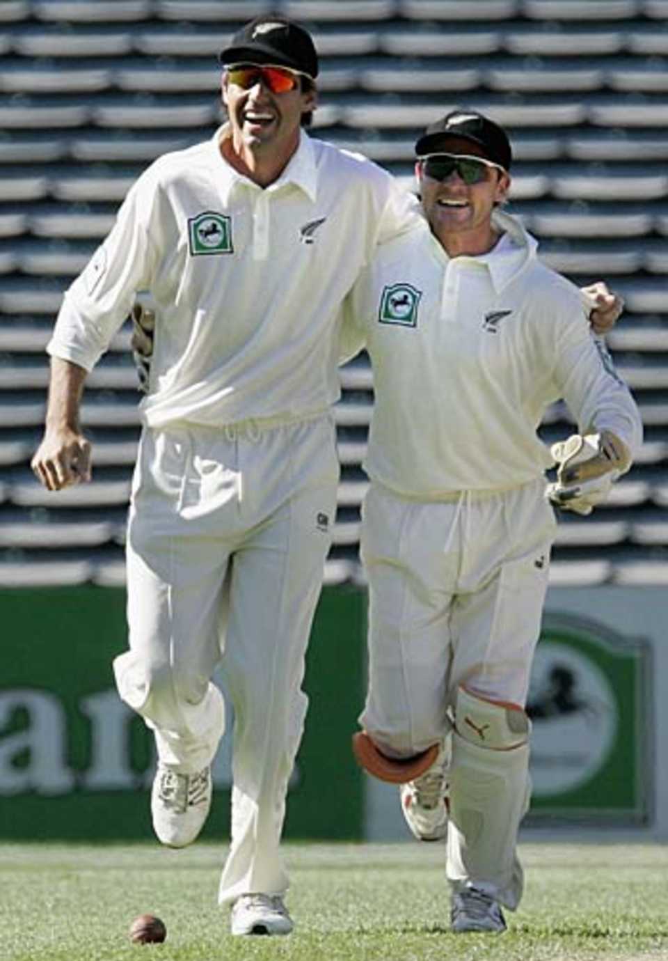 Stephen Fleming and Brendon McCullum celebrate the penultimate wicket, New Zealand v West Indies, 1st Test, Auckland, 5th day, March 13 2006