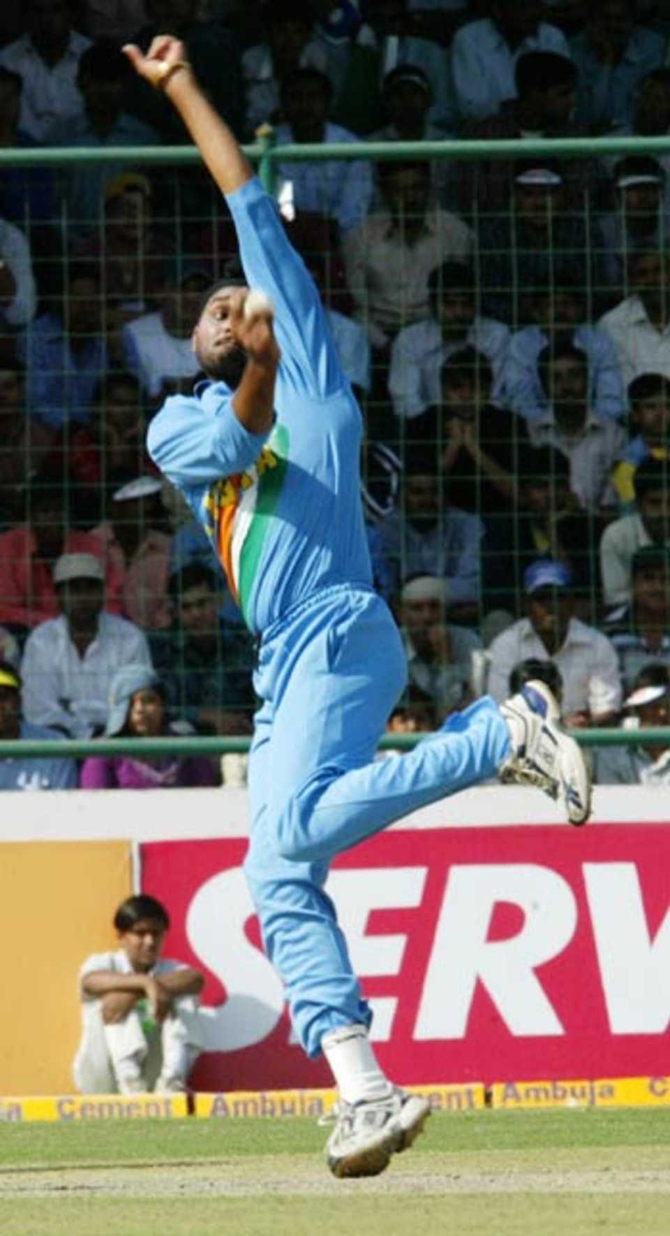 Harbhajan Singh in his delivery stride, India v England, 1st ODI, New Delhi, March 28 2006