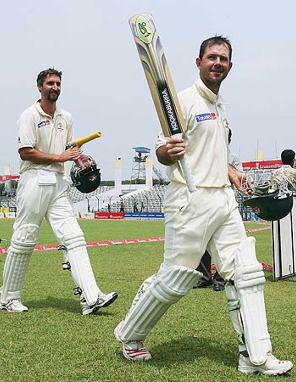Ricky Ponting and Jason Gillespie troop off after the victory