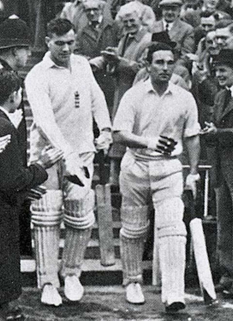 Alec Bedser and a bandaged Denis Compton resume England's innings