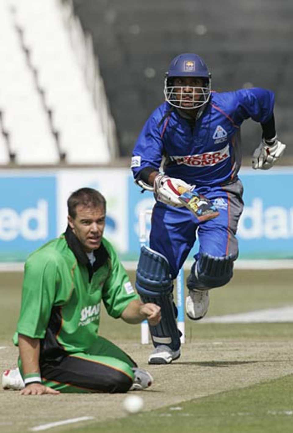Kumar Sangakkara drives past Heath Streak, Afro-Asia Cup,  Durban,  August 17, 2005