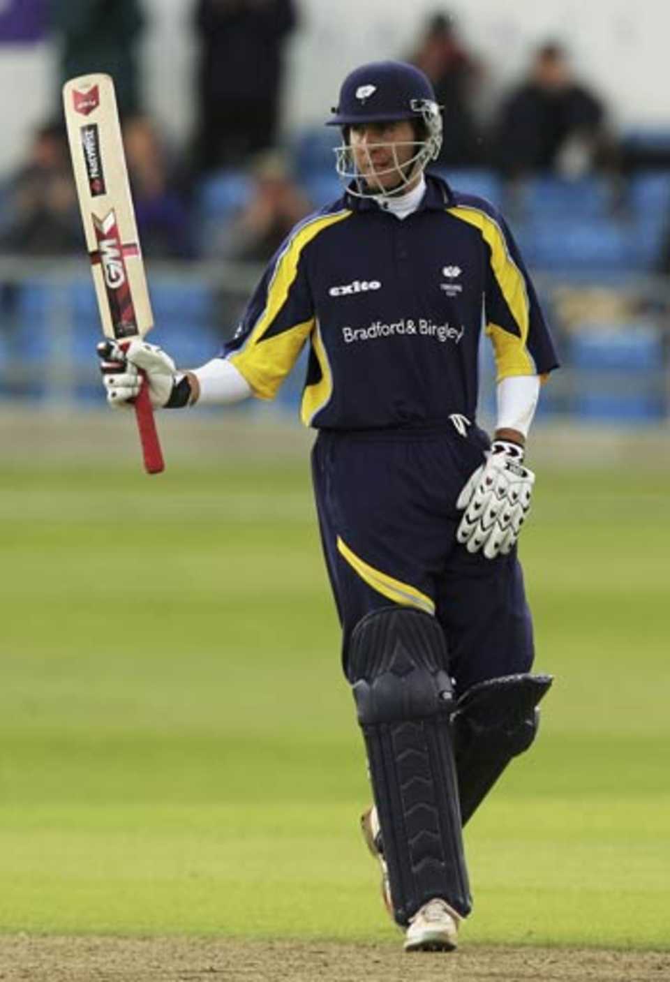 Michael Vaughan celebrates his fifty against Scotland, in his comeback match for Yorkshire