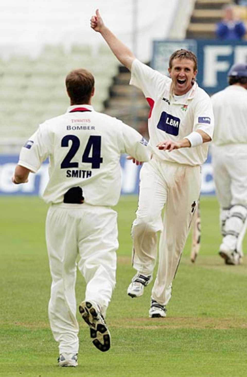 Dominic Cork celebrates another Warwickshire wicket