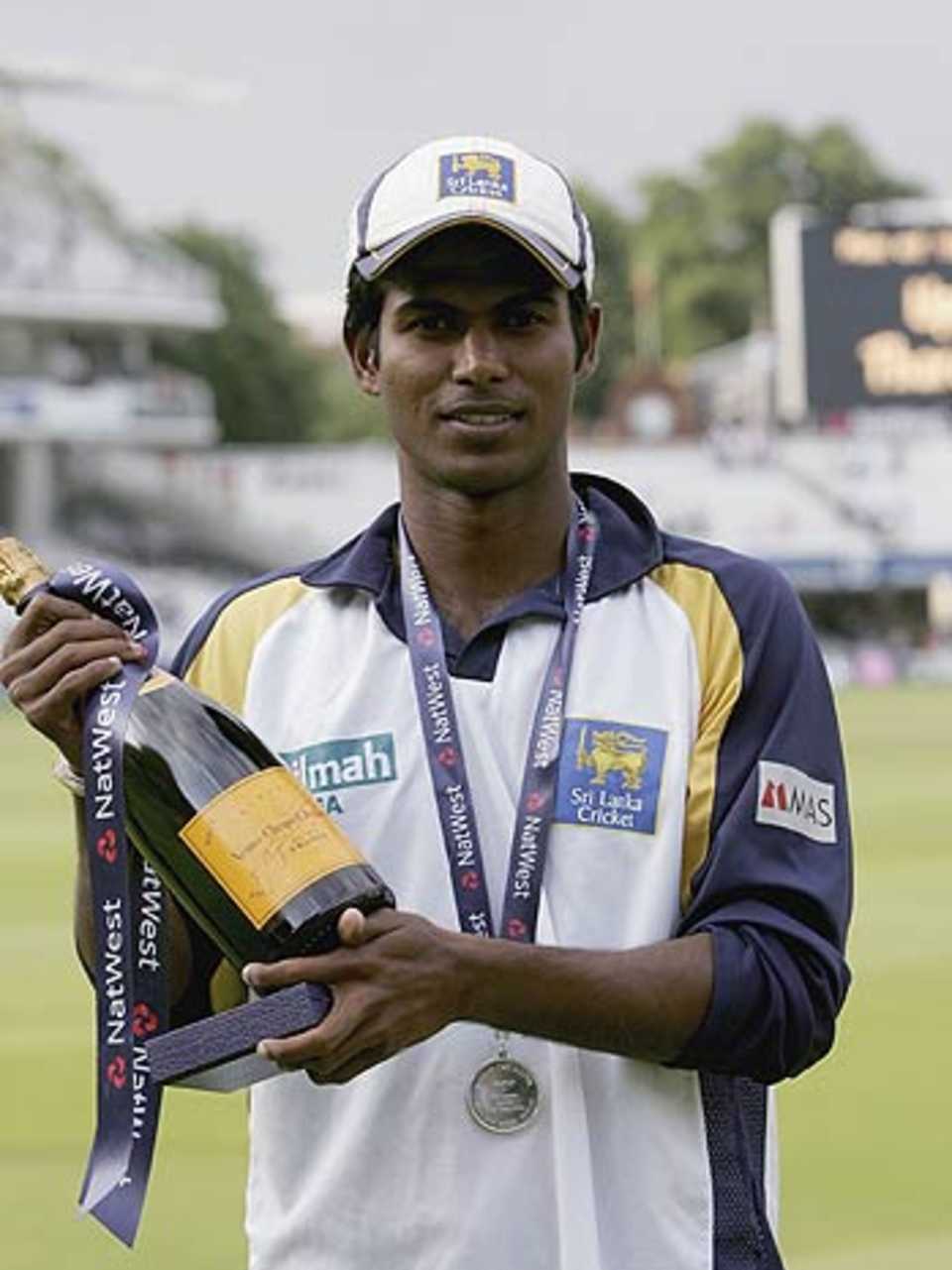 Upul Tharanga poses with his Man-of-the-Match award for his century
