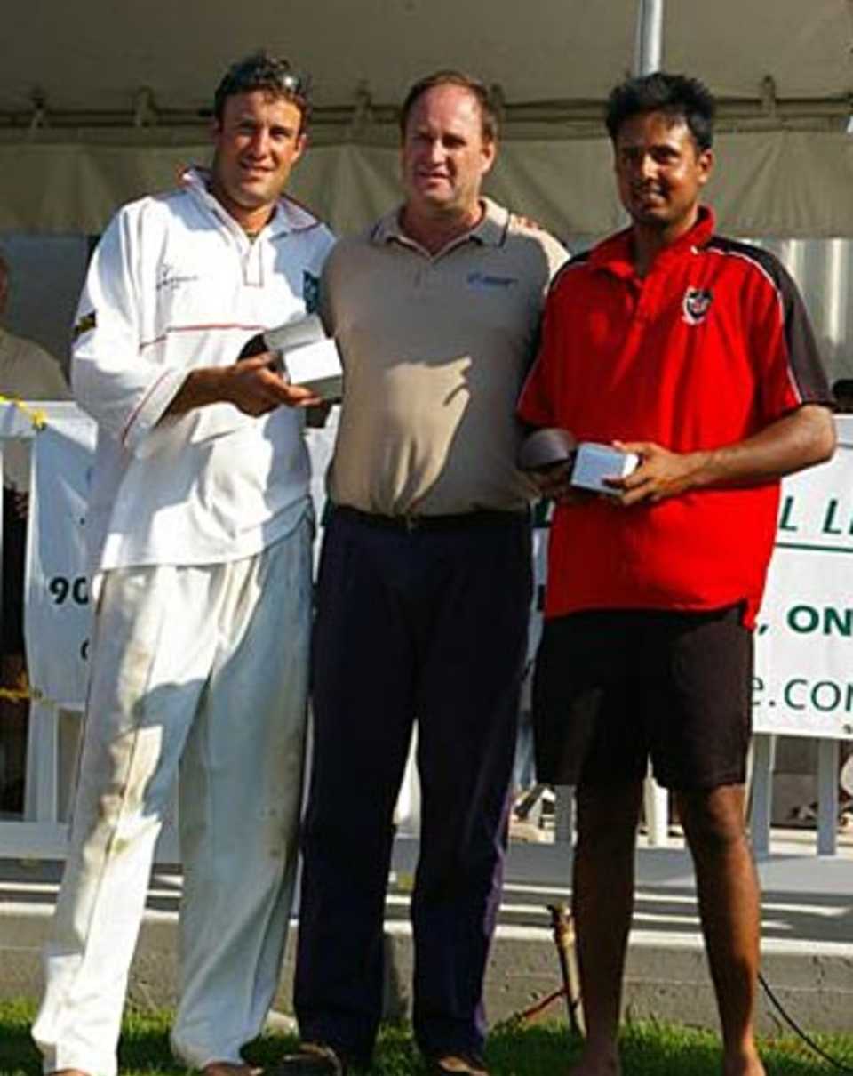 Geoff Barnett  and Umar Bhatti jointly receive Man-of-the-Match awards from  Richard Done of the ICC, Canada v Kenya, Ontario, July 31, 2006