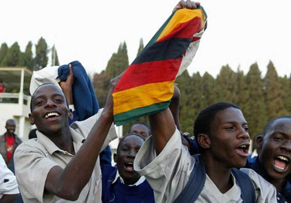 Delighted Zimbabwe fans celebrate their last-ball win, Zimbabwe v Bangladesh, 3rd ODI, Harare, August 2, 2006