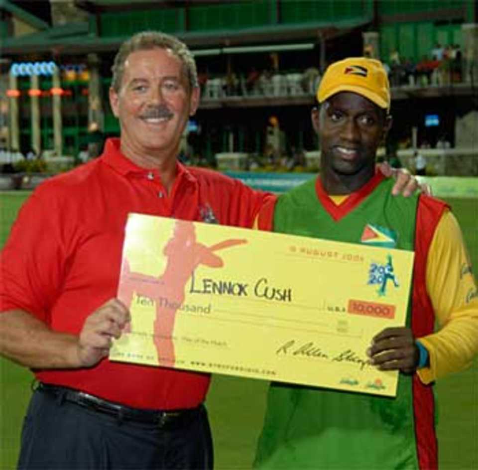 Lennox Cush receives $10,000 for his Play of the Match award, Grenada v Guyana, Stanford 20/20, 1st semi-final, 10 August 2006

