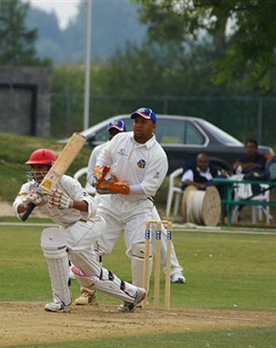 Abdool Samad drives during his innings of 119 