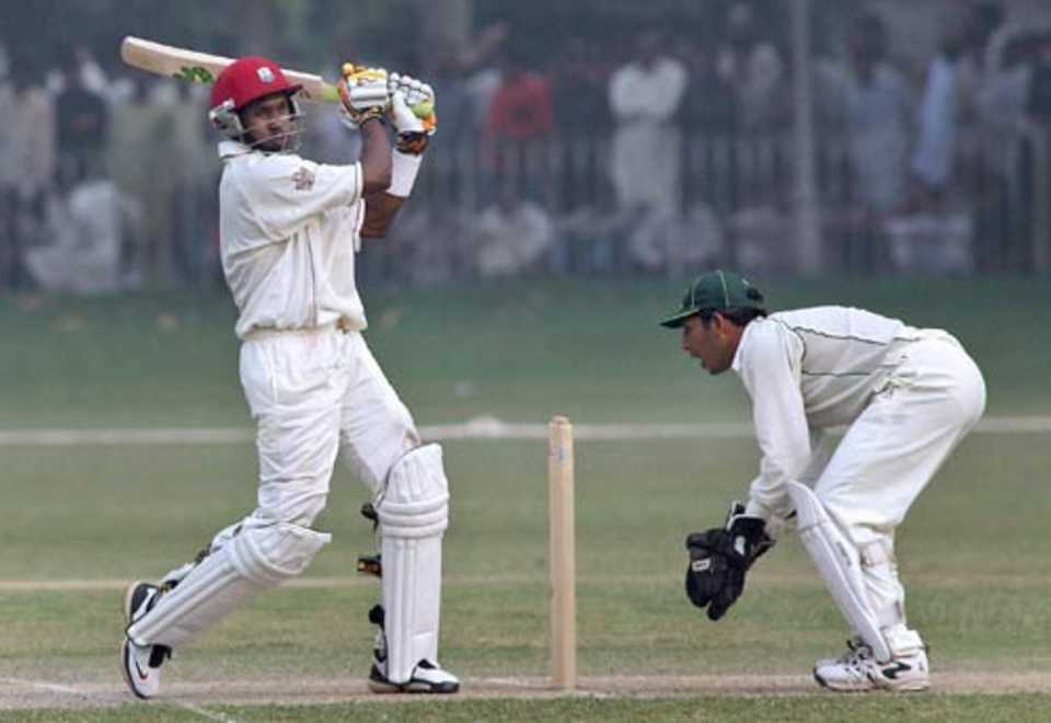 Dwayne Bravo pulls during his century in a warm-up game against the Patron's XI, Lahore, November 9, 2006