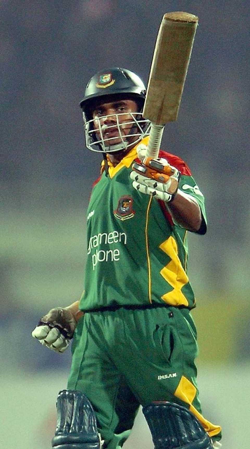 Mehrab Hossain jr raises his bat after scoring his maiden fifty, 2nd ODI: Bangladesh v Zimbabwe, Bogra, December 3, 2006