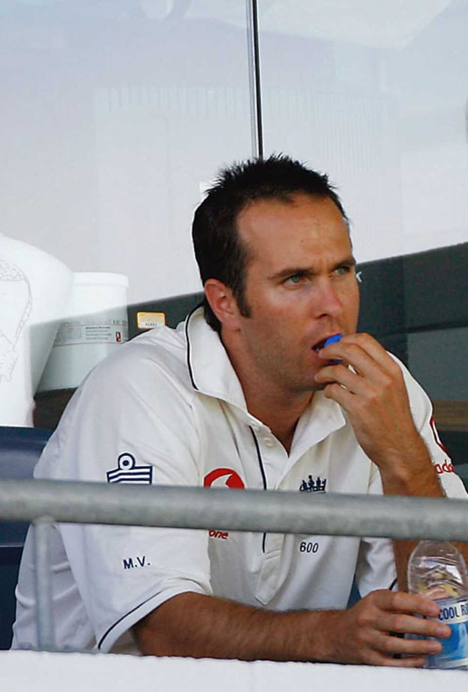 A pensive Michael Vaughan watches from the dressing room