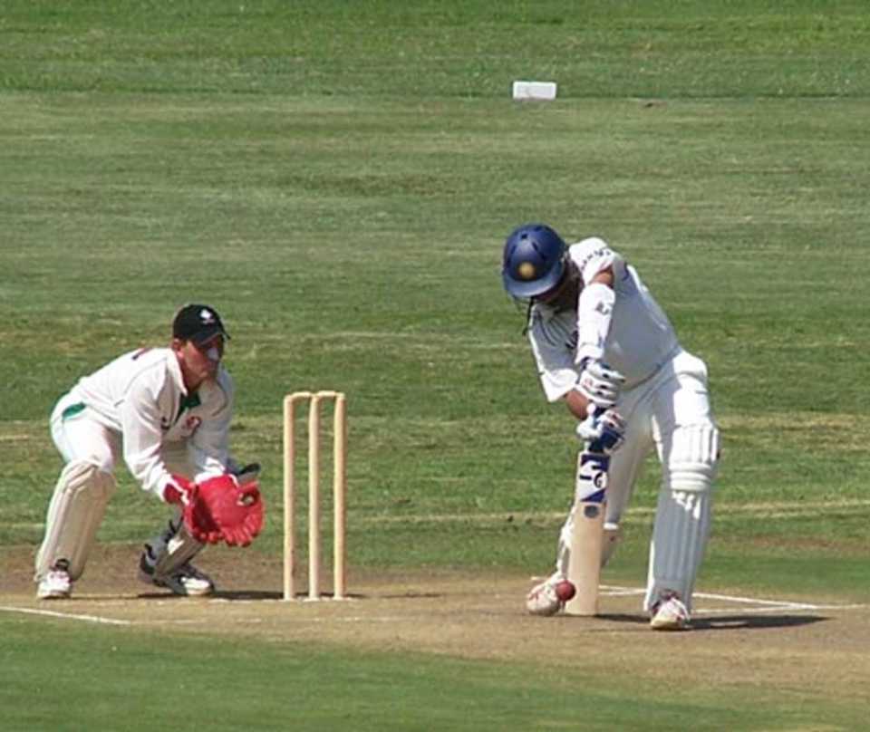 Head over the ball, high left elbow and all that jazz: Rahul Dravid cover drives during the tour game, KwaZulu-Natal Invitation XI v Indians at Durban, Dec 22, 2006