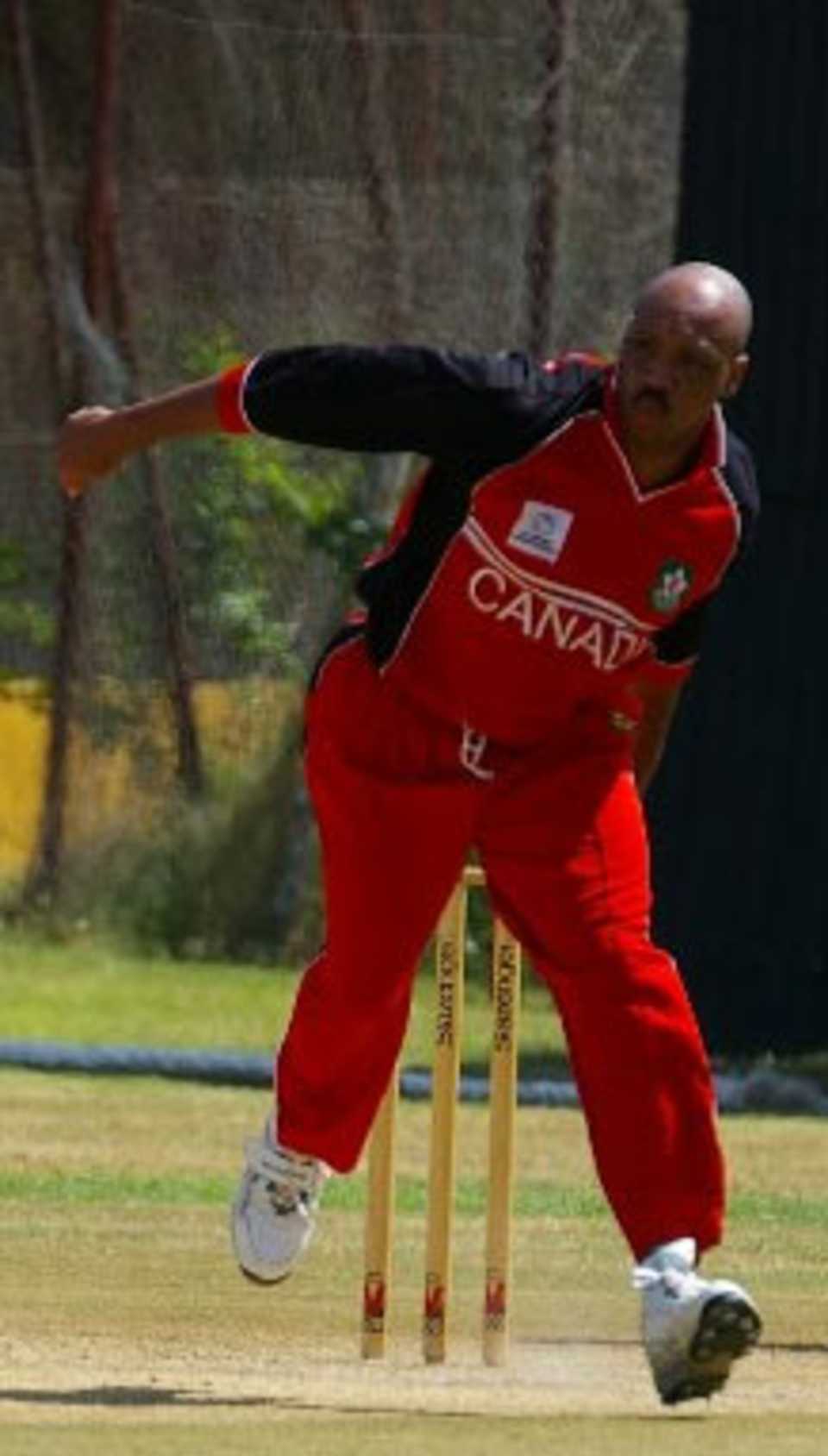 Anderson Cummins bowls his first over for Canada
