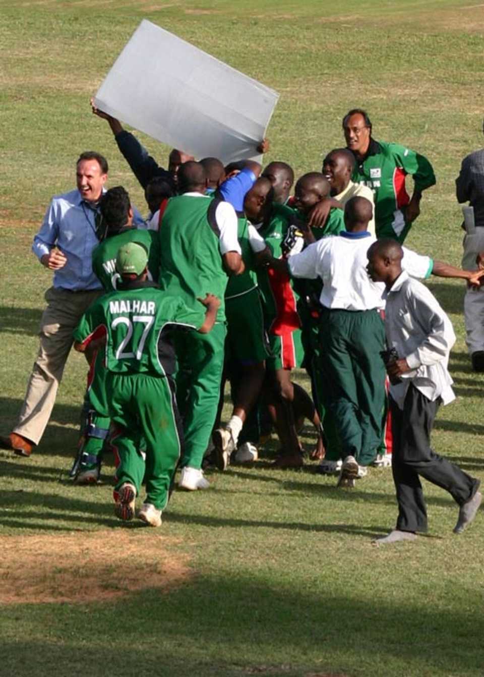 Thomas Odoyo is mobbed after his matchwinning 61, Kenya v Ireland, World Cricket League, Ruaraka, February 2, 2007