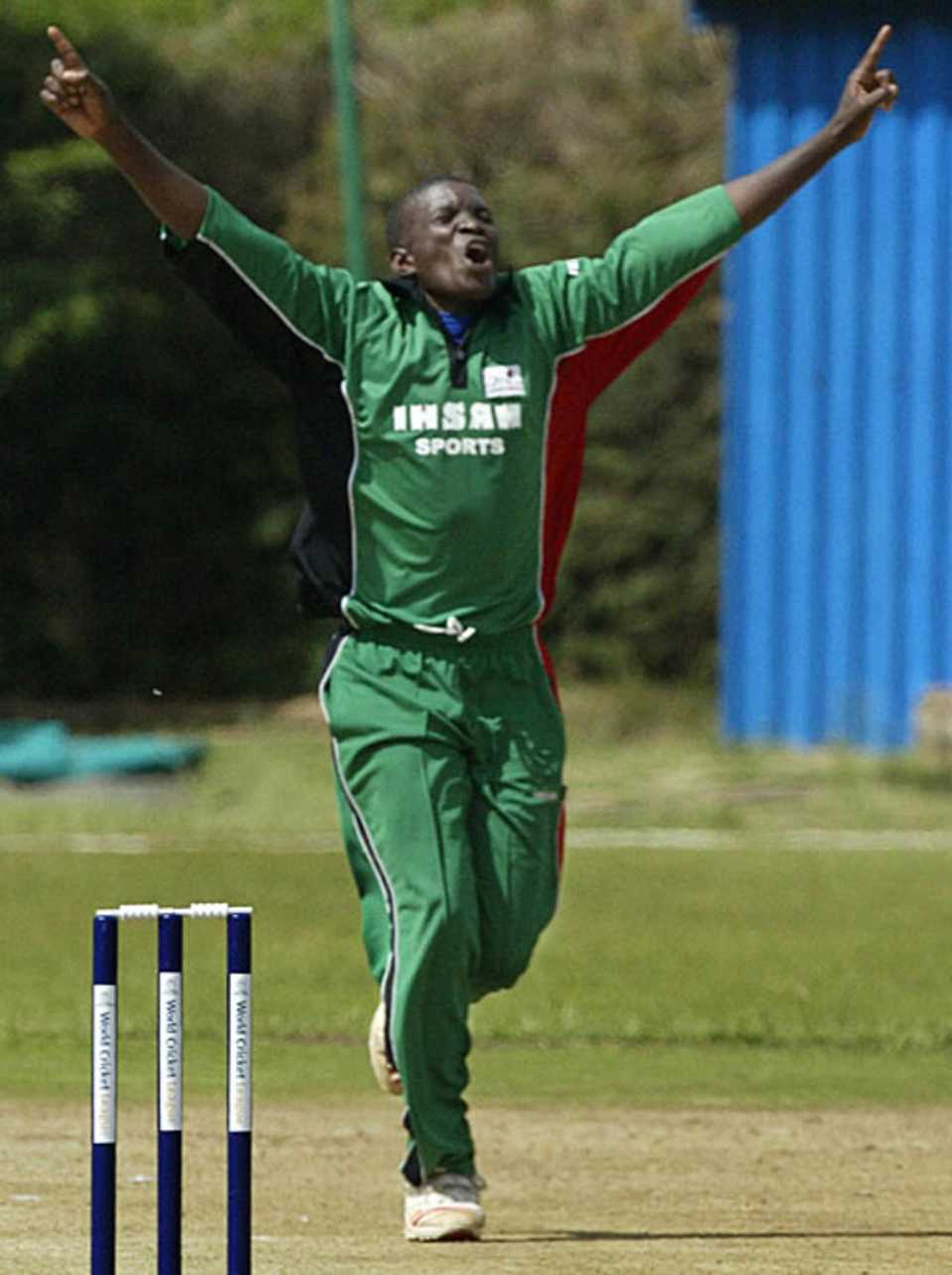 A delighted Peter Ongondo celebrates dismissing George Codrington to seal Kenya's win