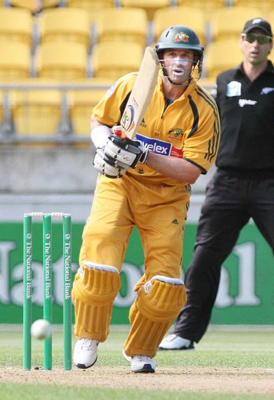 Michael Hussey plays down the ground during his innings of 42