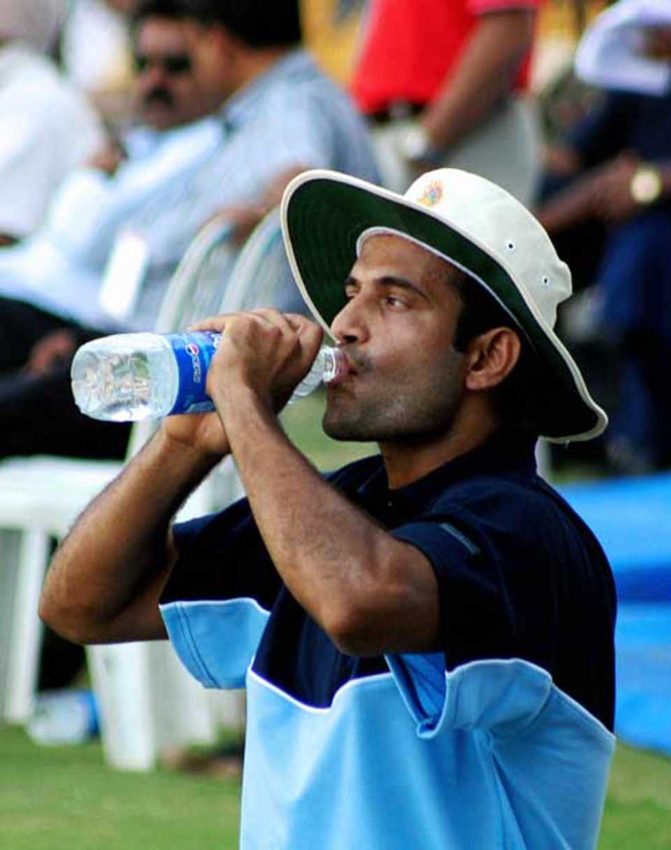Irfan Pathan takes a drink as he proves his fitness ahead of the World Cup