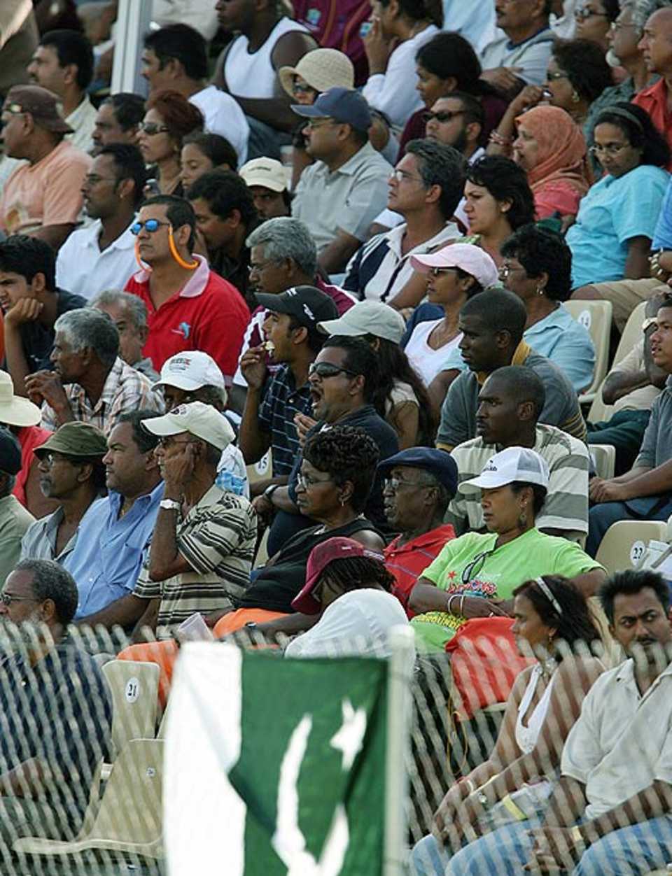 Cricket fans watch Pakistan batting during a warm-up match against South Africa