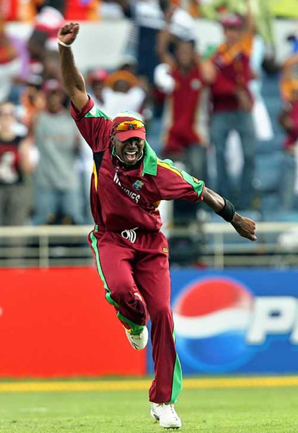 Dwayne Bravo celebrates his catch to remove Kamran Akmal, West Indies v Pakistan, Group D, Kingston, 2007 World Cup, March 13, 2007