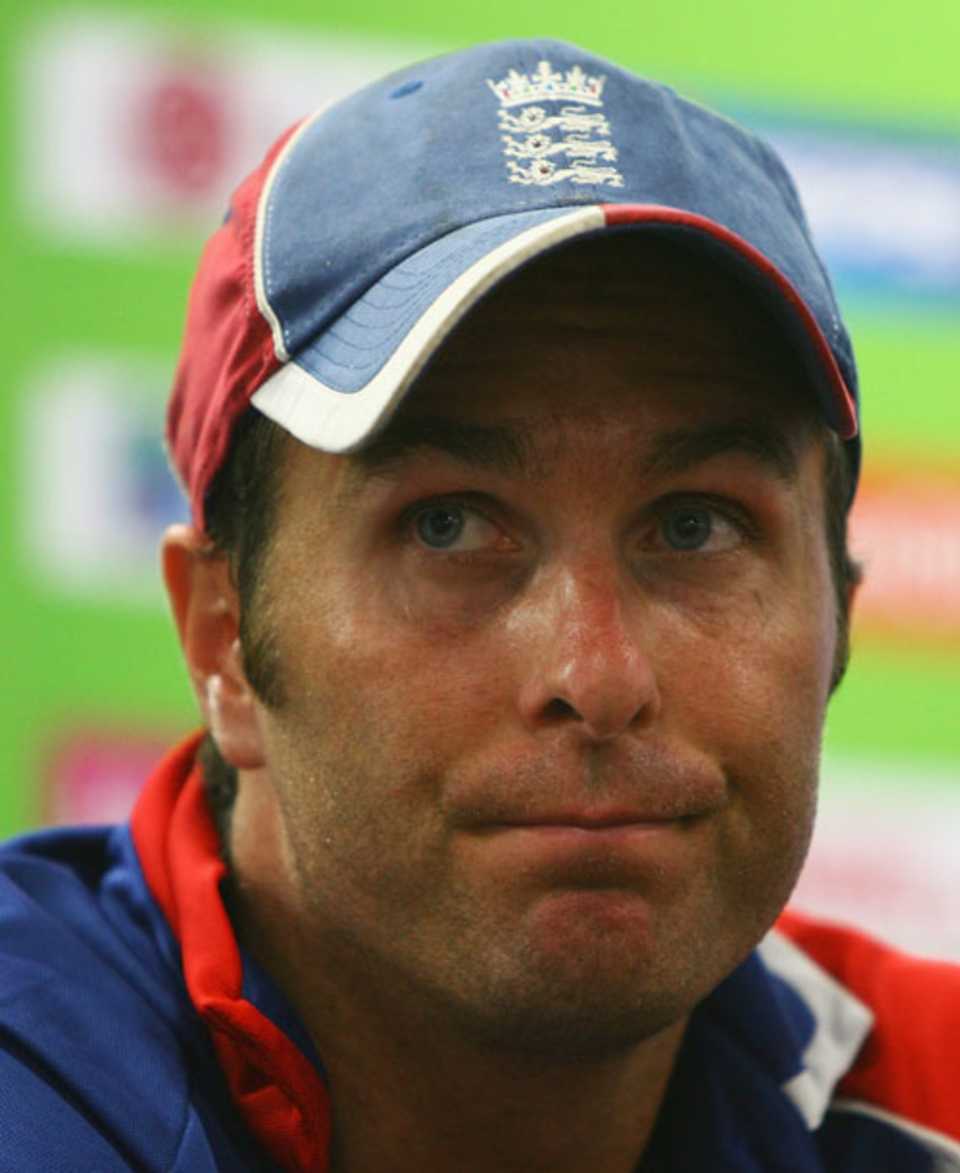 A grim-faced Michael Vaughan faces the press
