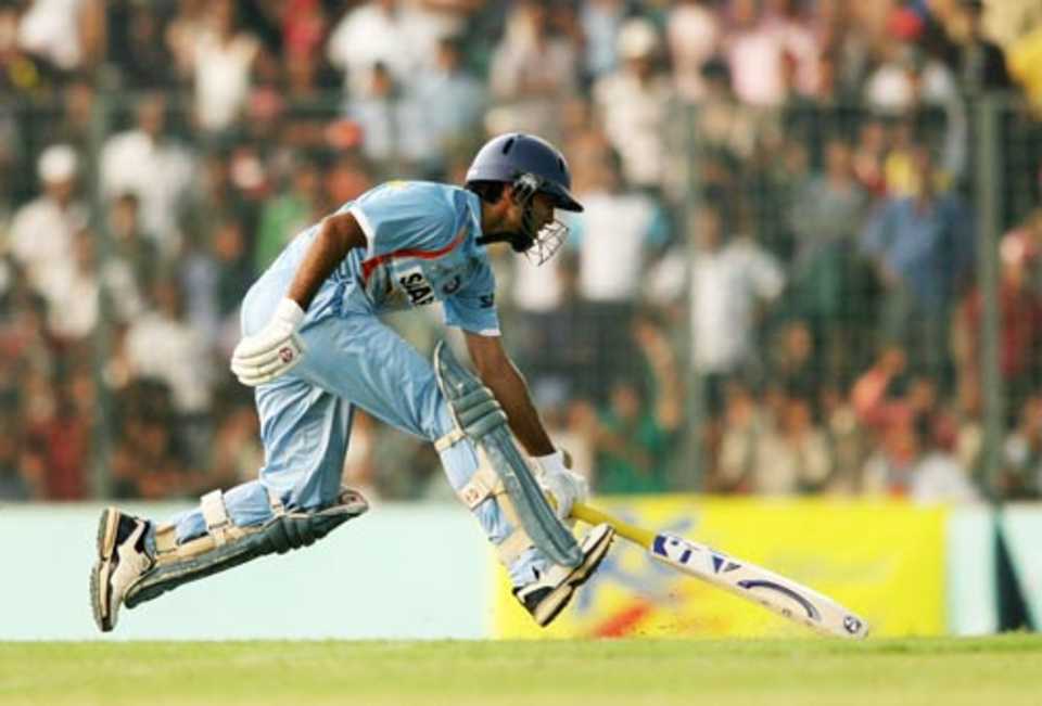 Dinesh Karthik scampers through for a single during his unbroken 107-run stand with Mahendra Singh Dhoni, Bangladesh v India, 1st ODI, Mirpur, May 10, 2007
