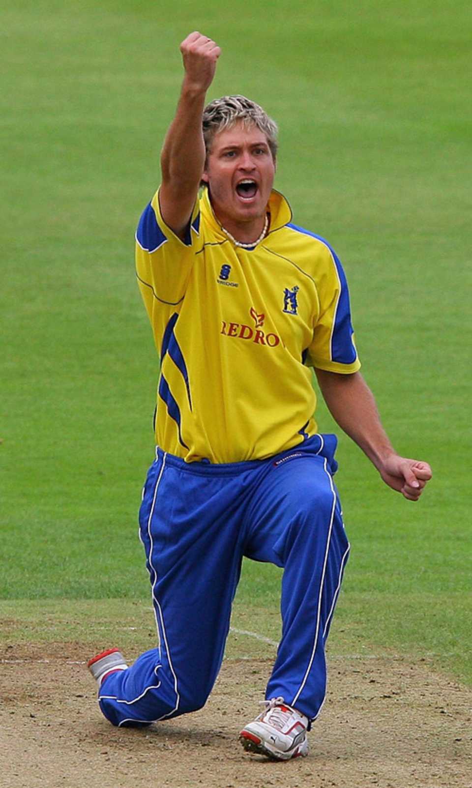 Paul Harris celebrates a wicket for Warwickshire