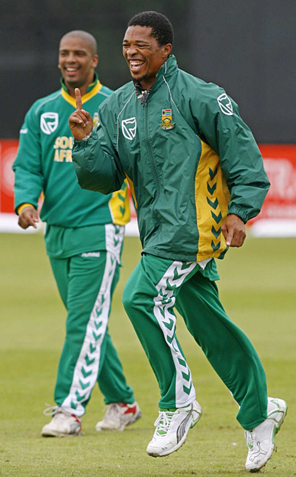 Makhaya Ntini larks about during a fielding session in Belfast