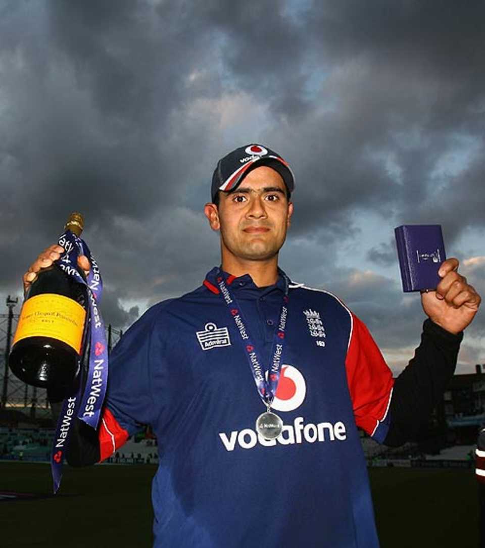 Owais Shah with his Man-of-the-Match medal and champagne