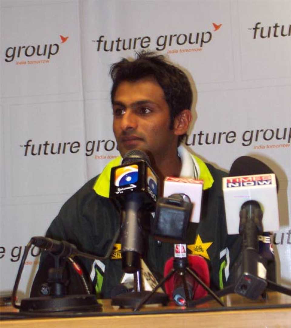 Shoaib Malik answers questions at a press conference before the match against India in Glasgow