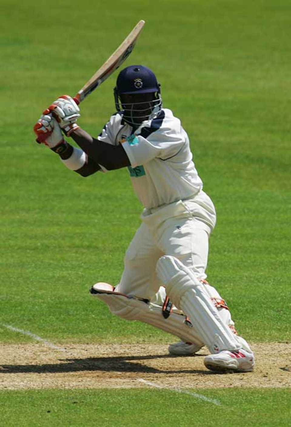 Michael Carberry cuts during his century