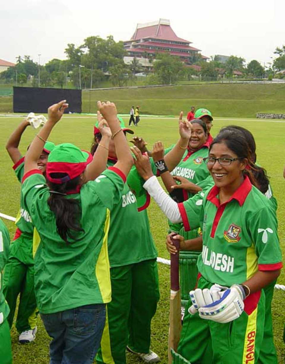 The Bangladesh team celebrate their win over Singapore