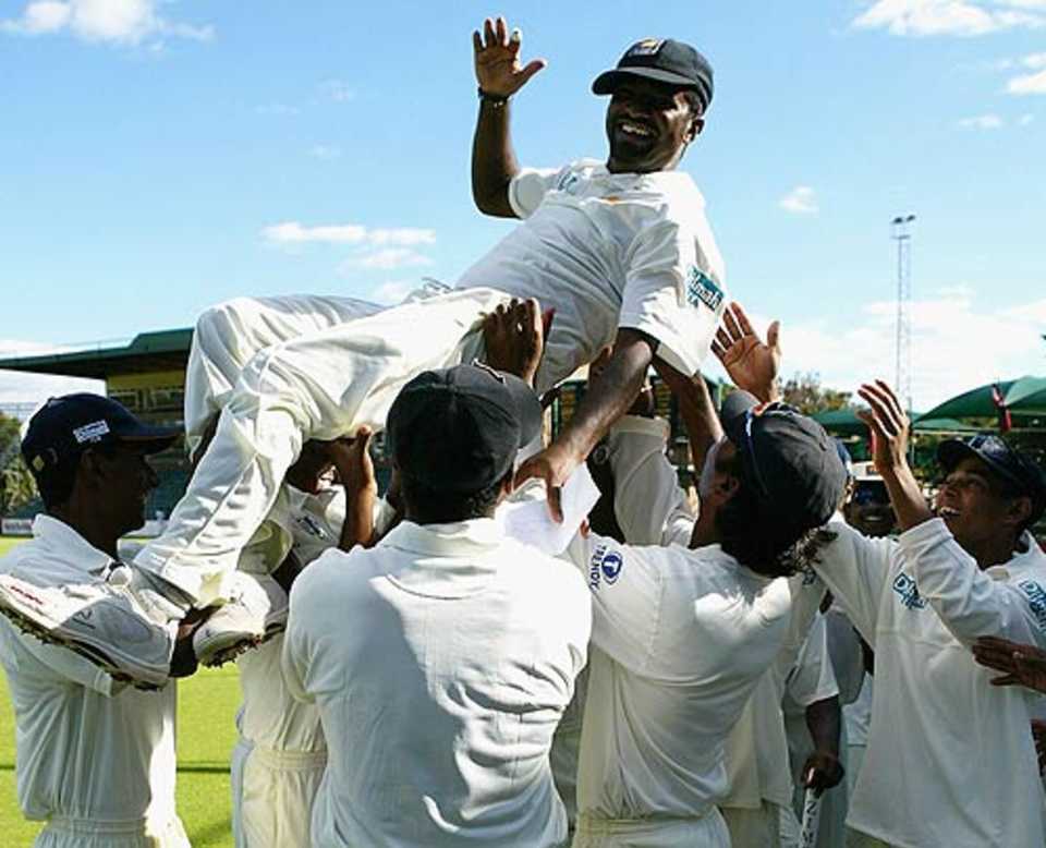 Muttiah Muralitharan is carried by his team-mates after breaking Courtney Walsh's record for the most Test wickets, Zimbabwe v Sri Lanka, 1st Test, Harare, May 8, 2004