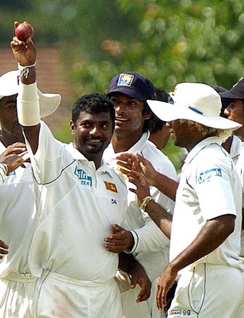 Muralitharan celebrates after reaching the milestone of 700 Test wickets
 