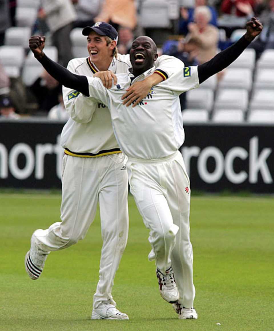Ottis Gibson celebrates another wicket on his way to his historic 10 for 47