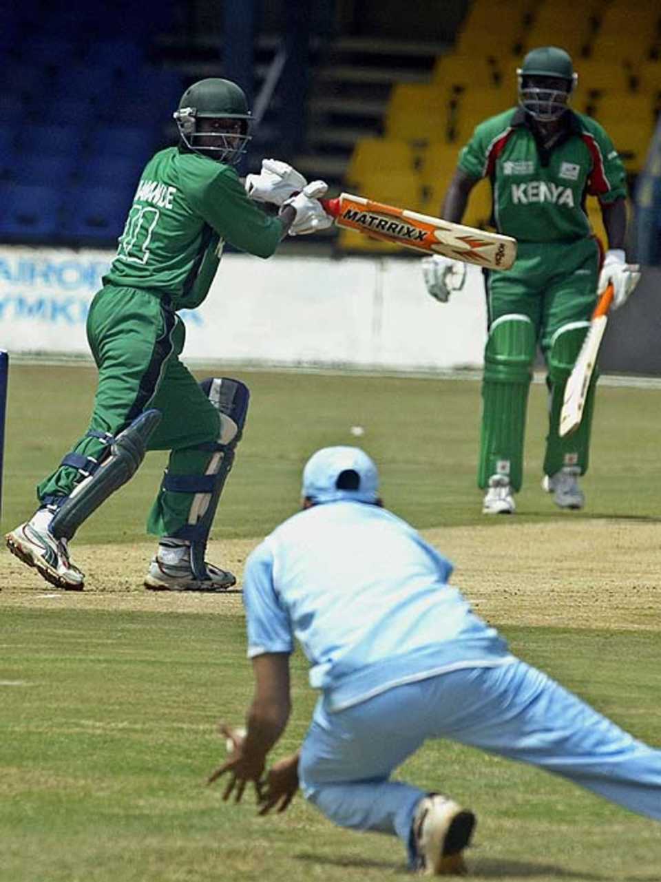 Jimmy Kamande is caught by Irfan Pathan at slip