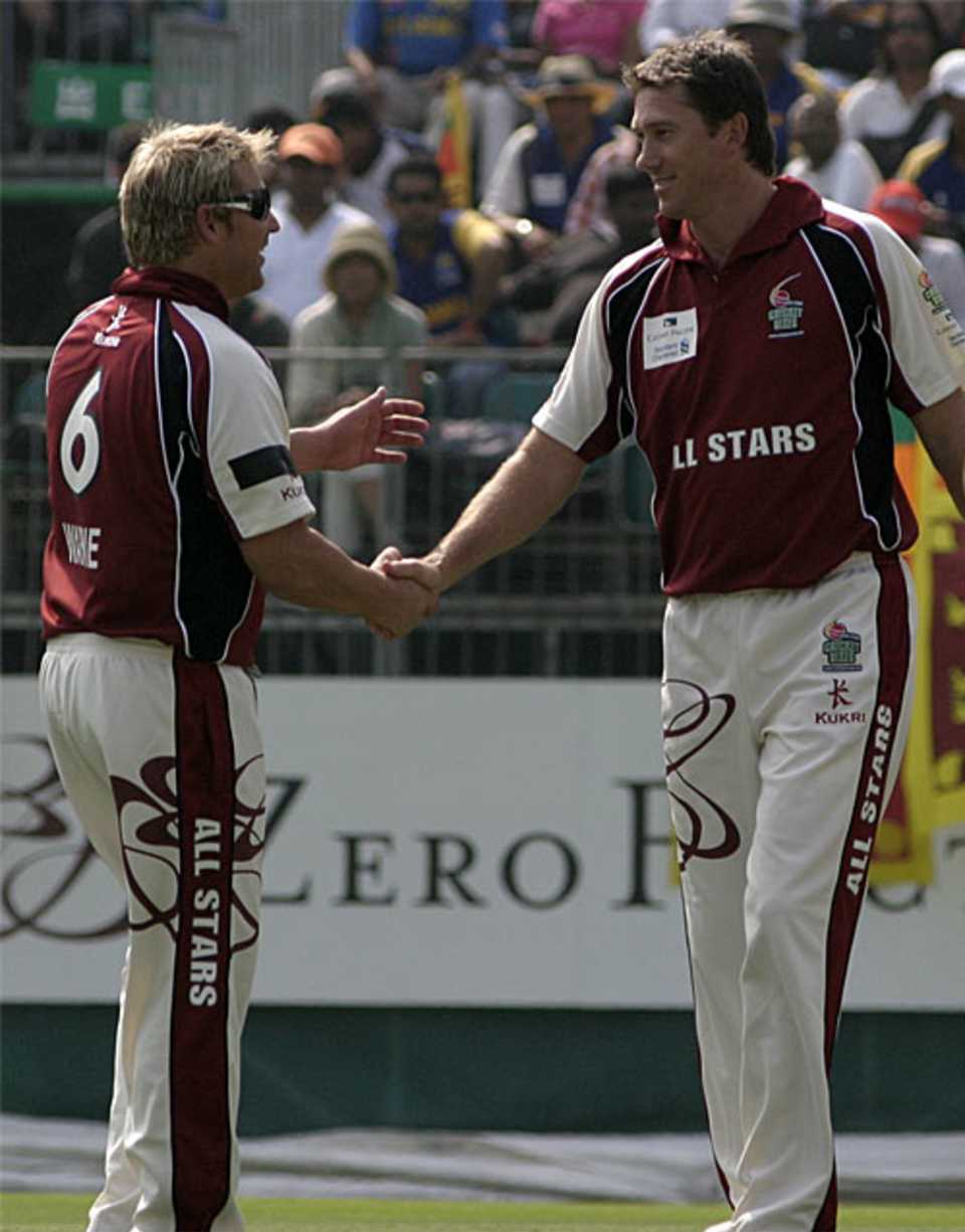 Glenn McGrath and Shane Warne shake hands during the Hong Kong Cricket Sixes