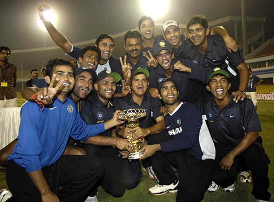 The victorious India Blue team with the trophy