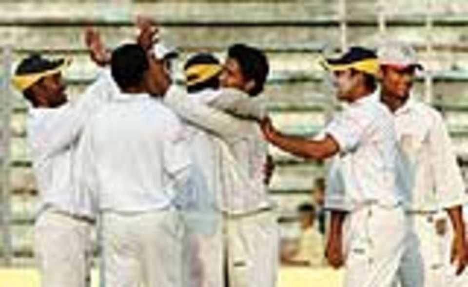 Chittagong players congratulate Kamrul Islam