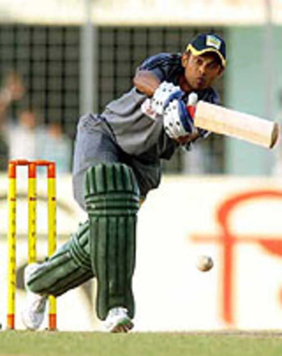 Chittagong's Faisal Hossain plays one straight during his 52