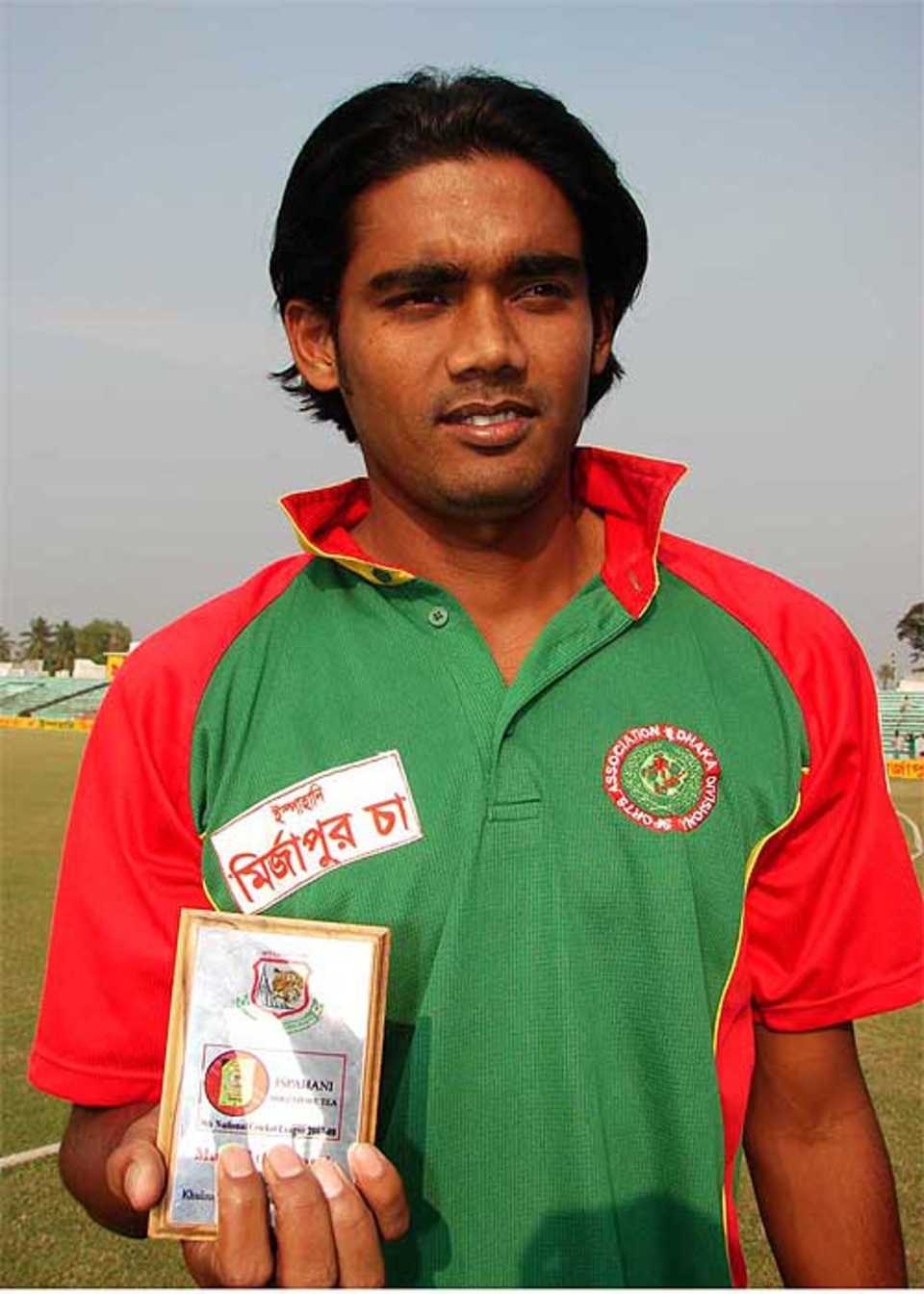 Dhaka's Mahbubul Alam poses with his Man-of-the-Match award