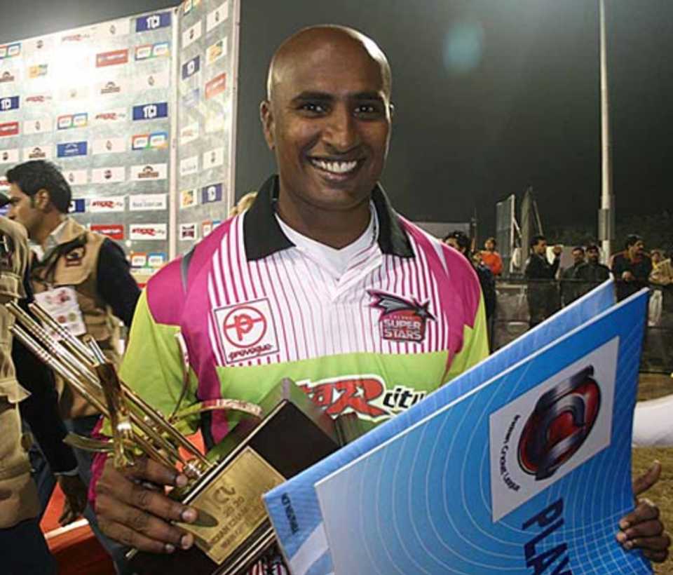 T Kumaran poses with his Man-of-the-Match award