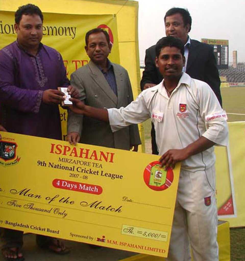 Sylhet's Golam Mabud receives the Man-of-the-Match award
