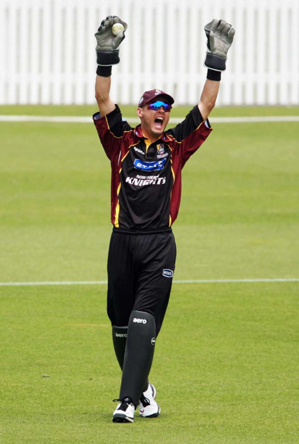 Peter McGlashan celebrates after taking a catch to get rid of Mohammad Ashraful 