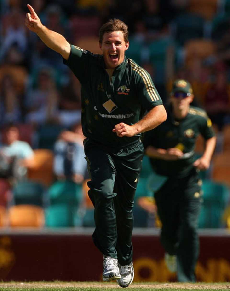 Brad Hogg's three wickets hastened New Zealand's defeat