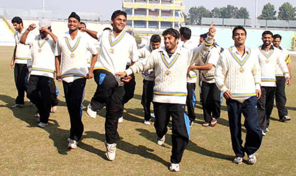The Punjab players celebrate after beating Orissa, Punjab v Orissa, Ranji Trophy Super League, Group A, 6th round, Chandigarh, 4th day, December 20, 2007 
