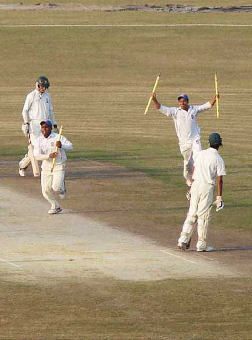 Khulna players celebrate after taking the last Barisal wicket